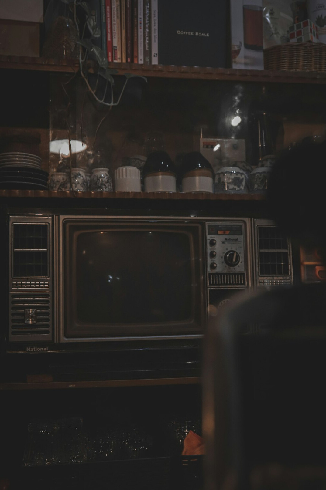 person watching old tv